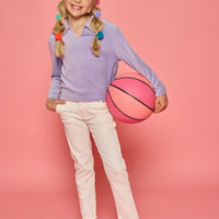 Model can be seen wearing a lavender pullover that features a fold over collar for easy over the head access. Paired back with basic white denim jeans to complete the look.