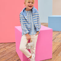 Model can be seen wearing a light blue shirt that features white dobby detailing and white lace stripes which pairs back perfectly with ivory jeans to complete the look.