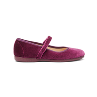 Purple velvet shoe with a strap on a white background mary jane for kids