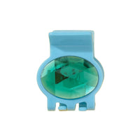 Blue hair clip with a green gemstone on a white background