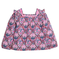 Girls pink and navy floral patterned blouse that features a ribbon detail along neckline and elastic cuffs at sleeves for a secure but relaxed fit.