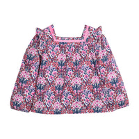 Girls pink and navy floral patterned blouse that features a ribbon detail along neckline and elastic cuffs at sleeves for a secure but relaxed fit.