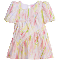 Girls/Tween woven dress in a bright pink/yellow/green watercolor print. Dress features a fun asymmetrical hem which adds a fun feature to the dress. Dress also has slight puff sleeves and also has a keyhole button closure on back of neckline.