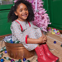 Little girl can be seen rocking our Porto Dress in our Christmas Vine floral pattern-BISBY girl