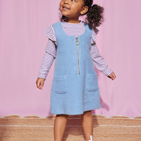 Our little model can be seen wearing our Retro Sherpa Jumper in Light blue with our Sadie Top in Lilac Sparkle Stripe layered underneath-BISBY girl