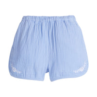 Girls/Tween hydrangea blue gauze shorts that feature an elastic waistband and white embroidery detail on front of shorts as well.