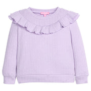 Girls cable knit lavender top that features a ruffle detail across bust/top of shirt.