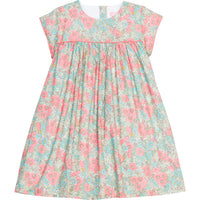 Girls woven dress in a pink/teal/green floral print that features a four button closure along back of dress and a pink trim across the bust and end of sleeves for an elevated look.