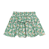 Girls woven skort featuring a green background with white, orange, and blue florals.