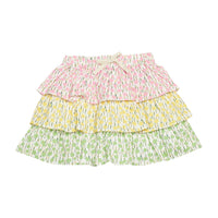 BISBY girl three tiered woven skort. Skort features pink floral print top tier, yellow floral print middle tier, and green floral print bottom tier, built in shorts, and an elastic waistband for an elevated look.