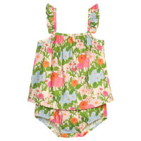 BISBY baby woven bloomer set in a green/orange/pink/light blue floral print. Top features a two button at back and ruffles at sleeves. Bottom features elastic waistband and stride for easy put on/pull off access.