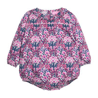 Navy and pink floral-patterned woven baby bubble that features button closure along back of neckline and at stride.