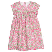 Girls pink and green floral dress with green piping along bust and trim of sleeves, that also features a four button closure along back of neckline.