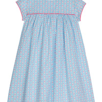 Girl dress with blue and pink daisy chain print, with hot pink trim across bust area and sleeves