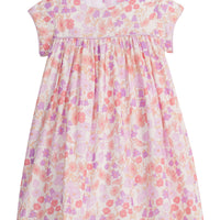 Girls/Tween short sleeve woven dress in a light purple/salmon/pink floral arrangement. Dress also features button closure at back and a light purple trim across the bust and continues at trim of sleeves for a nice extra detail.