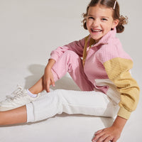 pink and white and gold color block split pants
