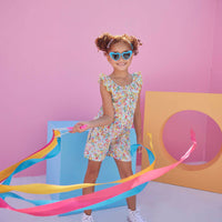 Girl/tween romper in our colorful Main Line Marigold floral features a ruffled/scalloped neckline and an elastic waistband for a comfortable relaxed fit. Best for last this romper also has pockets!