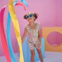 Girl/tween romper in our colorful Main Line Marigold floral features a ruffled/scalloped neckline and an elastic waistband for a comfortable relaxed fit. Best for last this romper also has pockets!