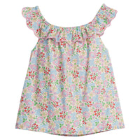 Girls/Tween woven top in a pale yellow/pink/green/red floral print. Top features a ruffle/scallop neckline that continues to the back and has a nice light pink trim.