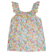 Girl/tween top with a yellow trim scalloped neckline, with red, yellow, blue floral print.