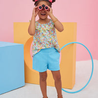 Yellow floral top with scalloped ruffle for girls with turquoise pique shorts