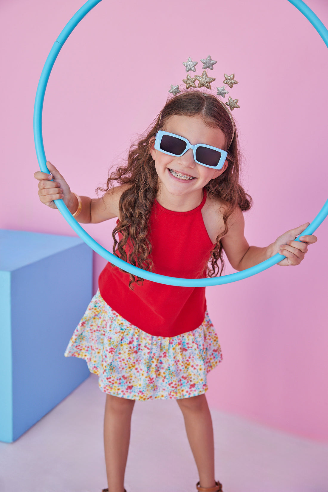 Girl/tween halter top in our vibrant red color. Halter top features button enclosure on the back and a stretchy relaxed fit, paired perfectly with our new Sally Skort in our Main Line Marigold floral pattern.