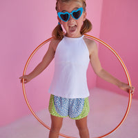 BISBY girl rocking our new track shorts in our Mixed Lawn Floral Pattern. This floral pattern contains blue and green base colors with white floral arrangement all over the shorts. Pair it back perfectly with our white halter top for an active/sporty look.
