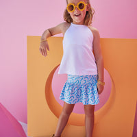 BISBY girl in our Sally Skort in our fun Blue Ripple pattern which has built in shorts and stretchy waistband. Pair it back with our halter top in white for a complete look.