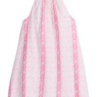 Girls/Tween woven dress in a light pink/hot pink floral print. Dress features a halter neckline and has button closures along back for a relaxed but secure fit.