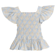 Girls/Tween woven top that has a ruching feature across middle of top. Top is made of yellow and white flowers printed on a light blue background and also features angel sleeves to complete the look.