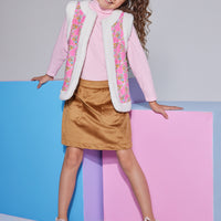 Girls/Tween ribbed turtleneck in a bubblegum pink shade, made of a soft knit material which is a perfect layering piece to go under the reversible vest seen pictured. The other side of the vest is the same material as the brown skirt and so the top two pieces pair nicely with the mini skirt in brown suede to complete the look.