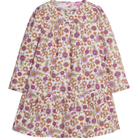 Girls/Tween woven dress in our Thistle Floral which contains an arrangement of magenta/purple/orange/and green flowers. Dress features a two-tier detail with button enclosures along the back-BISBY