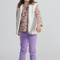 Girls/Tween lightweight corduroy pants in lilac. Pants have a button clasp closure for easy pull on access and has pockets as well. Paired back perfectly with our woven long sleeve top in a magenta floral pattern with a reversible sherpa vest to finish off the look.