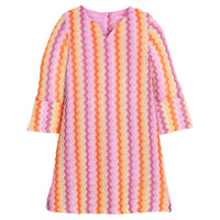 Girls/tween colorful striped dress with a zigzag pattern that features a button closure at back and slight v-neck neckline for an elevated look.