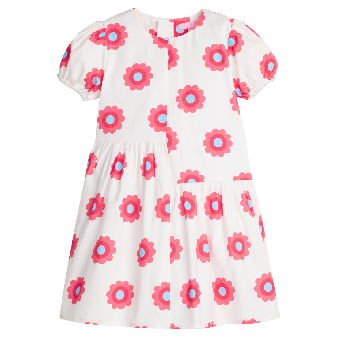 Girls/Tween woven asymmetrical cut dress in white with big red/blue flowers printed on it. The cuffs at sleeves are elastic and there is a zipper along back for a relaxed but secure fit.