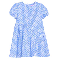BISBY girl knit dress in a white/blue floral print. Dress features an asymmetrical cut body, elastic cuffs at sleeves, and a zipper closure along back of dress.