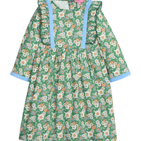 Girls/tween woven 3/4 length sleeve dress in a green/blue/orange floral pattern. Dress features button closures at back, ruffle detail along outside of bust, and a blue velvet trim detail along ruffles and sleeve ends to elevate the look.