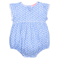 BISBY baby knit bubble in a blue and white floral print. Bubble features button closure along back and stride, white ric rac detail across the middle/bust area, and white ric rac detail along sleeve cuffs for an elevated look.