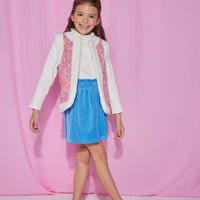 Girls/Tween velour skirt in a French blue color. Skirt features an elastic waistband and made of a super soft stretchy material for ultimate comfort. Model can be seen wearing a ribbed turtleneck in ivory underneath a reversible sherpa/suede vest to complete the look.