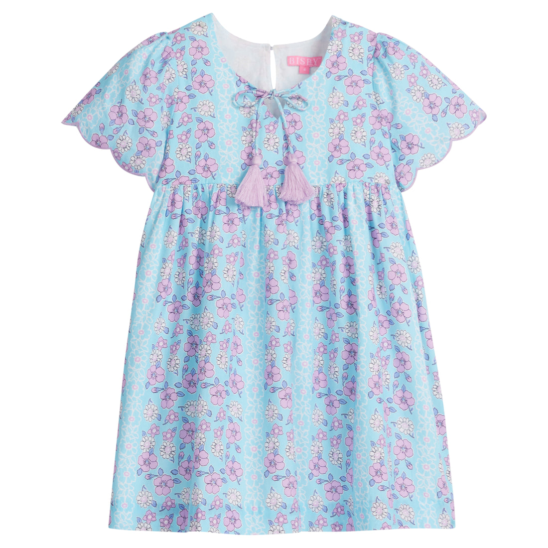 Girls/Tween woven dress in aqua/purple/white floral pattern. Dress features a slight v-neckline, tie tassel at neckline with lilac tassels, and scallops at end of sleeves to complete the look. There is also a button closure at back for a relaxed but secure fit.