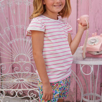 BISBY girl in our Rosie Short Set. The top is an angel sleeve knit tee with pink and white stripes paired with our Tulip Garden print shorts.