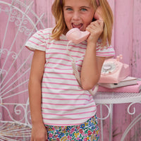 BISBY girl in our Rosie Short Set. The top is an angel sleeve knit tee with pink and white stripes paired with our Tulip Garden print shorts.