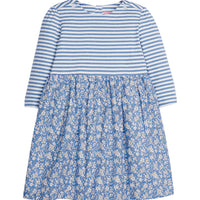 Girls dress in our Roland Floral Blue floral pattern which features a blue and white knit top half and woven floral pattern on bottom half. Dress is super lightweight and has button enclosures on the back and at top of sleeves-BISBY