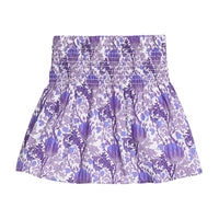 Girls/tween woven skort in a blue/purple/white floral print that features a ruched/elastic waistband and built in shorts for a secure but relaxed fit.