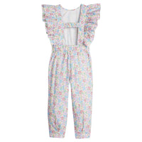 Girls/Tween woven jumpsuit that features ruffle detail along the front/sleeves, pockets, and a front tie with an open back. Jumpsuit has a beautiful pale yellow/pink/green/blue floral pattern and is a lightweight woven material for ultimate comfort.