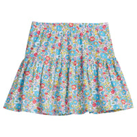 Girls/Tween woven skort that has built in shorts. Skort has an elastic waistband and is designed with a mixed floral print perfect for spring.