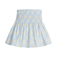 Girls/Tween woven skirt with ruching across top half in a light blue/yellow/white floral print.