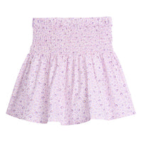 Tween skirt with ruching across top half, covered in light purple and darker purple daisies.