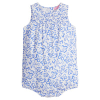 Baby girl woven bubble in a blue and white floral print. Bubble features button closure along back and stride for a secure but relaxed fit.