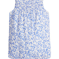Baby girl woven bubble in a blue and white floral print. Bubble features button closure along back and stride for a secure but relaxed fit.